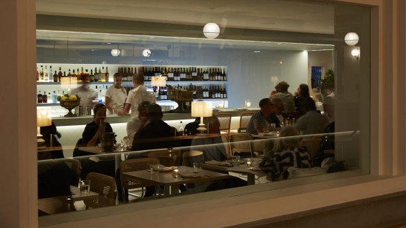 Topikos Dining Room and Bar combines two shopfronts at Bondi Beach.