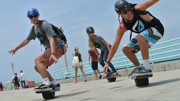 High-tech commuters glide past the road rules.