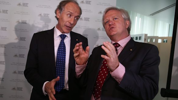 Chief Scientist Alan Finkel (left) and ANU Vice-Chancellor Brian Schmidt celebrate the detection of gravitational waves at Parliament House on Friday.