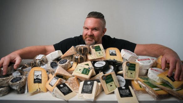 Dan Sims of Mould Collective with their cheese products.