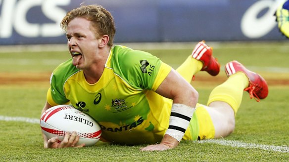 Henry Hutchison of Australia scores during the successful Sydney Sevens tournament.