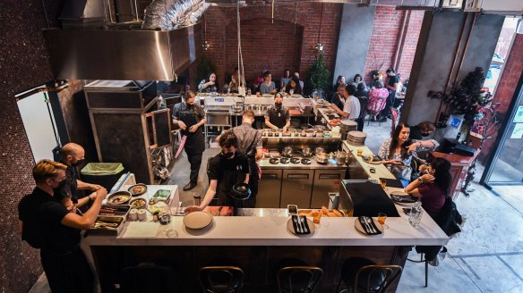 Groups of four can sit ringside and try dishes the kitchen is developing.