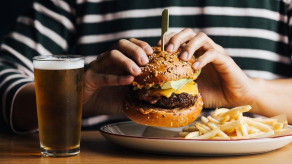 Pub classics such as burgers and fish and chips are on the menu at the Beach Hotel, Albert Park.