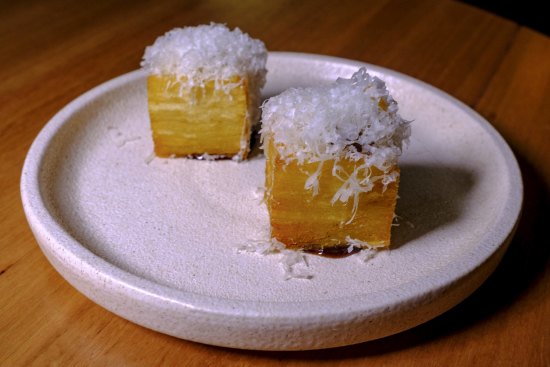 Pommes anna with black garlic vinegar and parmesan.