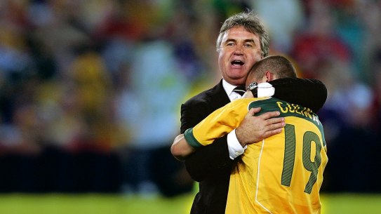 Good times: Coach Guus Hiddink savours Australia's qualification for the 2006 World Cup.