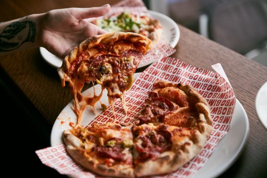 Pizzas are almost always on special at Bimbo for $4.