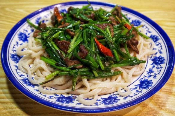 Go-to dish: Wheat noodles with chives and sliced lamb.