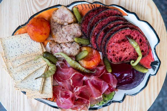 Coppa and butifarra with cornichons, sweet plum paste, crackers and Tonton bread.