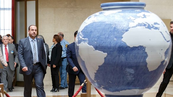 Syria's main opposition High Negotiations Committee (HNC) leader Nasr al-Hariri arrives to take part in another round of negotiations  in Geneva.