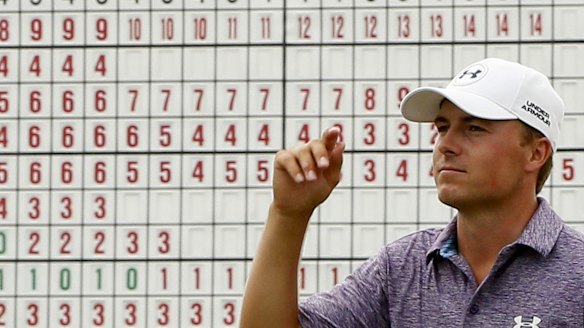 Jordan Spieth walks off the 18th green after a second outstanding round.
