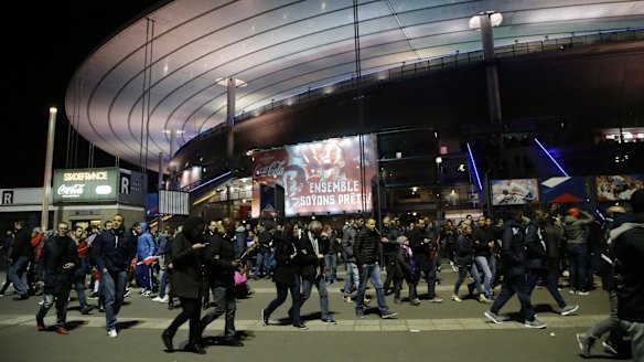 People leave the Stade de France stadium after the international friendly soccer France against Germany on Friday.
