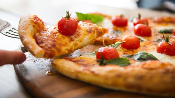 Cutlery may be required for the pizza (margherita pictured).