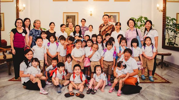 Ahok with the pupils of the Domba Kecil school in April 2016.