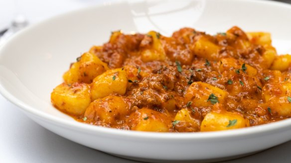 Gnocchi with braised lamb shoulder, capsicum, thyme.