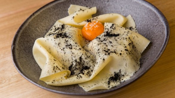 Vegetarian carbonara: Fazzoletti pasta with egg yolk and roast pumpkin.