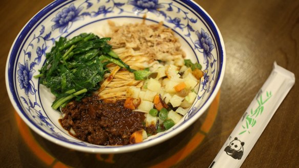 Dry biang biang noodles with minced pork and Chinese vinegar.
