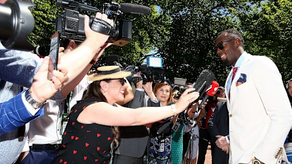 Usain Bolt meets the media during Oaks Day at Flemington.