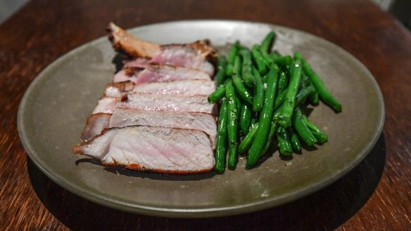 Go-to dish: Western Plains pork chop with crunchy green beans.