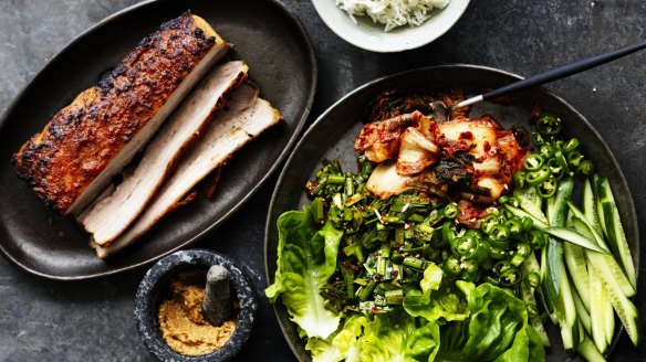 Korean ssam - lettuce wraps with pork belly, rice and kimchi.