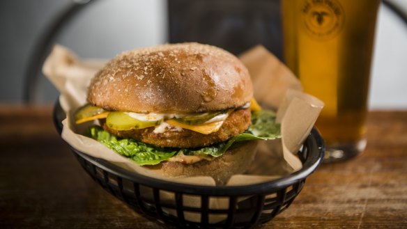 Vegan southwest 'chicken' burger with chipotle mayo (vegan), lettuce, pickles and vegan cheese at the Bad Shepherd brewpub in Cheltenham, Victoria.