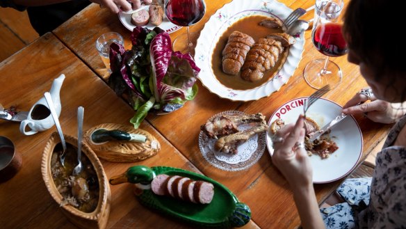 Canard a la presse is served with roast duck breast, duck leg casserole, duck neck sausage and garden salad. 