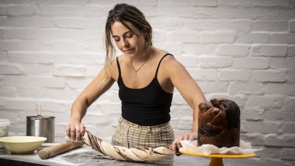  Michaela Johansson from Aplenty in Redfern prepares a Babkattone dessert. 