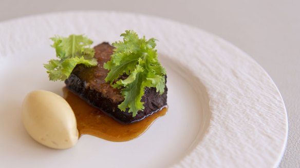 Wagyu with uni butter and wasabi leaf.