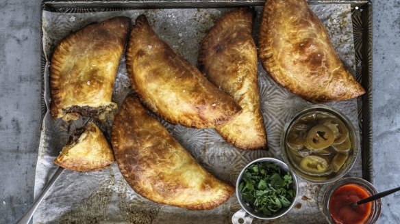 Empanadas filled with beef, chorizo and roasted tomatoes.