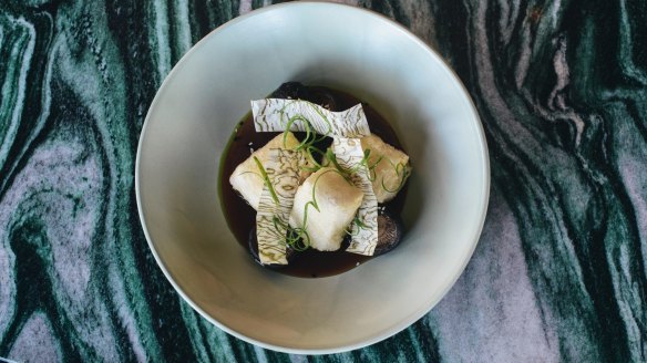 Fried tofu, pickled shiitake, bonito, soy, spring onion oil and sesame.