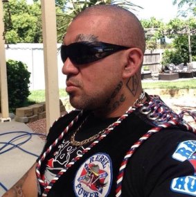 Bikie Alex Bourne, formerly of the Rebels, now Comanchero, with the "1%" tattoo on his neck.