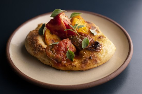 Go-to dish: Catalan coca, featuring tomatoes on a springy sourdough base.