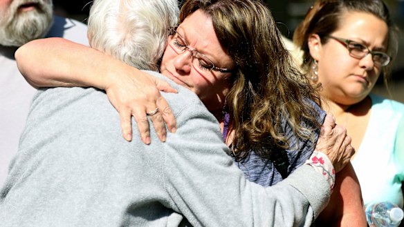 Friends and family are reunited with students after the shooting.