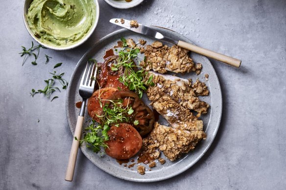 Mexican-inspired nachos schnitzels with quick pickled tomatoes and avocado.