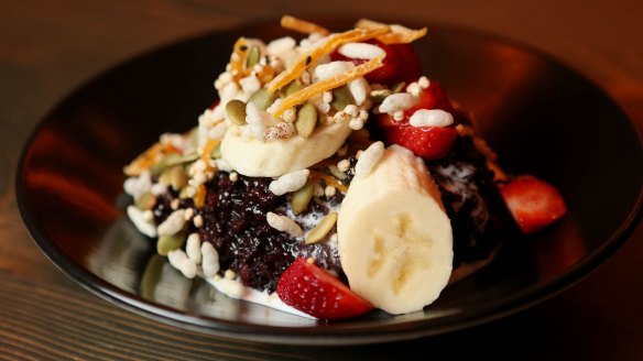 Black sticky rice, strawberries, banana, coconut cream and dried mango granola at Magic Mountain Saloon.