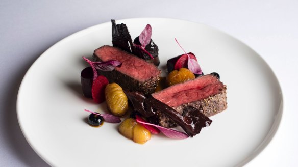 Juniper-crusted vension saddle, beetroot, boudin noir, roasted chestnuts, cocoa paper at est.