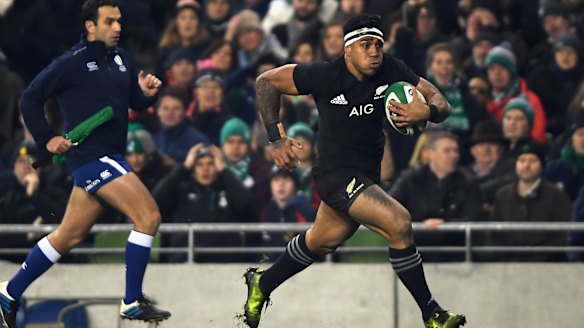 Revenge: Malakai Fekitoa breaks through to score as the All Blacks beat Ireland in Dublin.