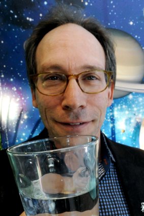 Theoretical physicist Lawrence Krauss with a glass of star stuff aka water at CSIRO Discovery Centre.