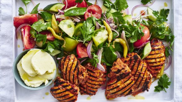Garlicky grilled chicken with a simple salad.