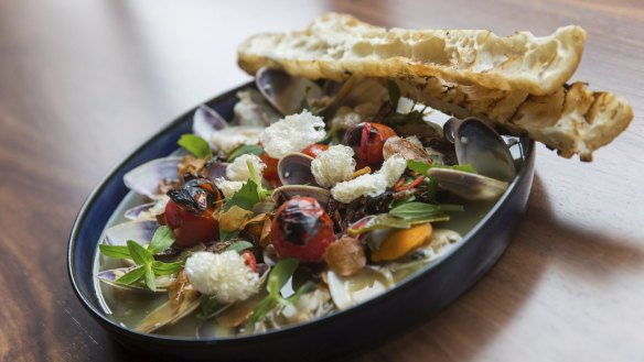 Grilled pipis in tomato and tamarind broth with Chinese doughnuts.