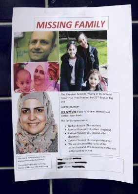 A poster appealing for information about missing residents seen near Grenfell Tower.