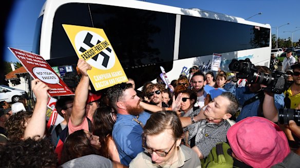Anti-racist activists stop Q Society members boarding a bus at St Kilda Marina.