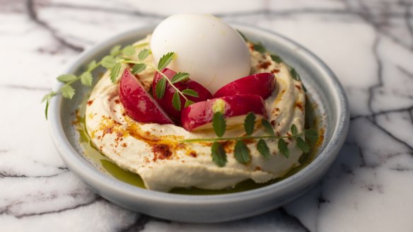 Don't miss the fresh hummus with radishes and smoked egg. 