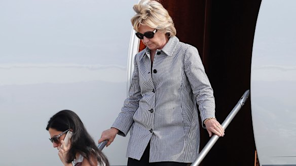 Abedin on the campaign trail with Hillary Clinton. 