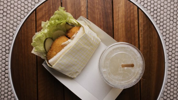 Fluffy white bread is wrapped around crumbed fish in a kebab-style take on the genre at Fish and Lemonade.