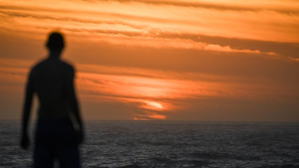 Bathers hit Coogee Beach early on February 10, one of the city's hottest days during a record-breaking summer.