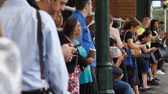 Waiting: The industrial action on Thursday morning meant many people were left waiting on platforms as full trains went past. 