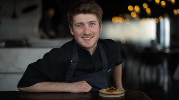 Vue de Monde executive chef Hugh Allen with a raw long-spined sea urchin tart.
