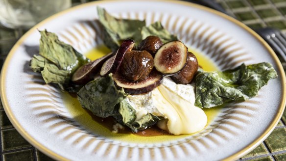 Baked Stella Alpina cheese with figs.