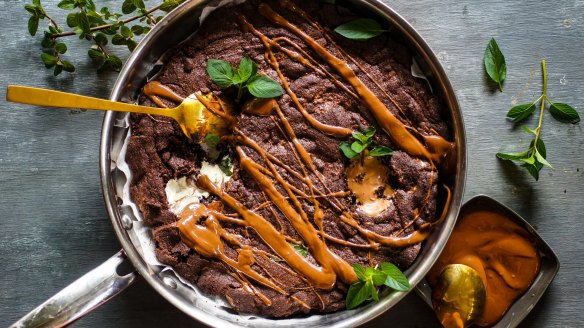 Giant triple chocolate cookie drizzled with hot fudge sauce.