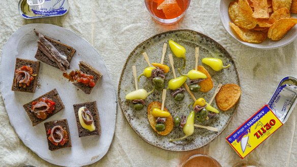 Gildas (right) and anchovy toasts. 